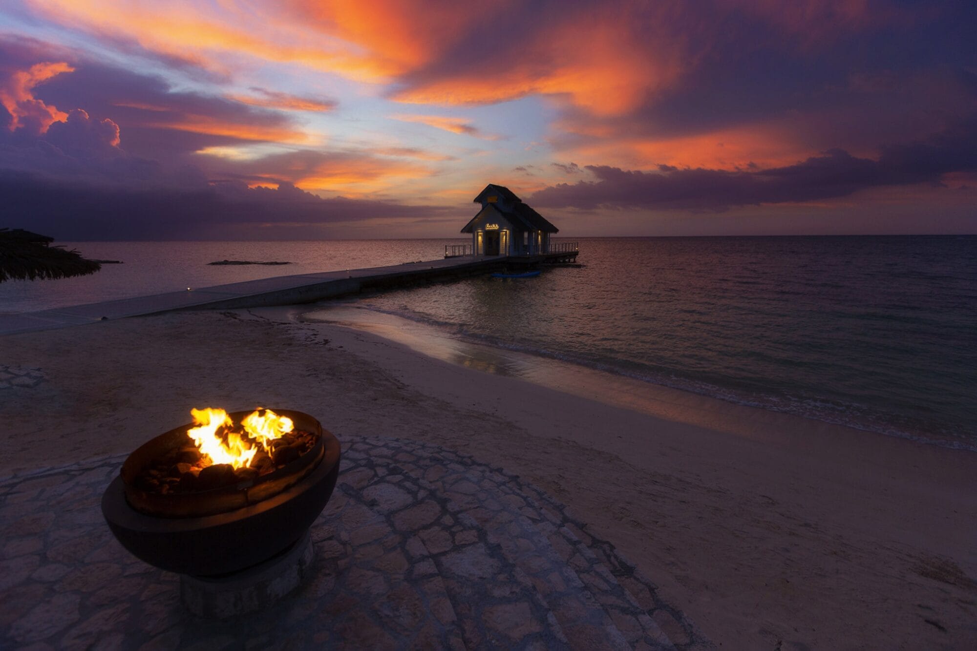 The coast of Montego Bay, Jamaica, with crystal-clear Caribbean waters and a tropical shoreline—perfect example of the many things to do in Montego Bay