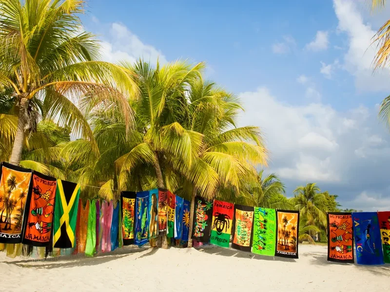 Group of travelers on Jamaica excursions exploring tropical landscapes with a local guide
