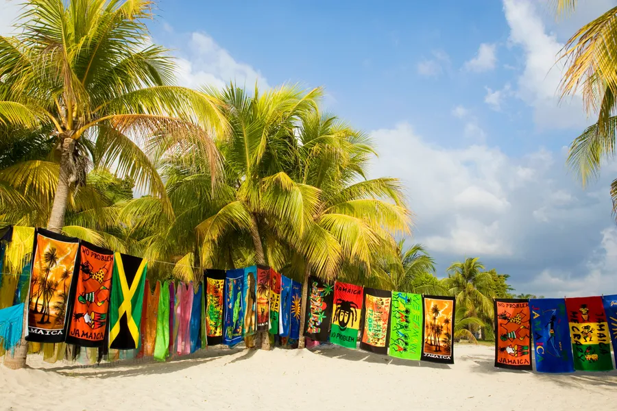 Group of travelers on Jamaica excursions exploring tropical landscapes with a local guide